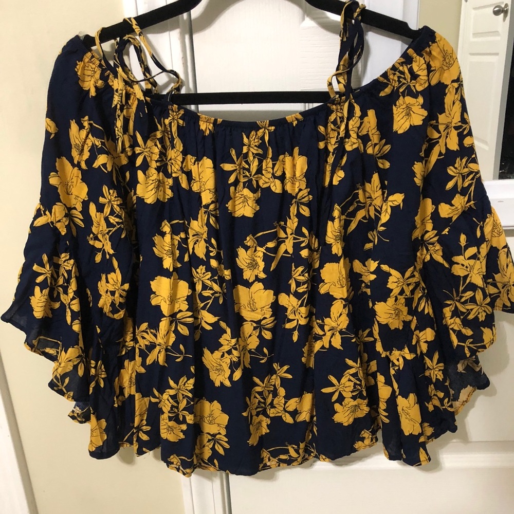 Quarter length sleeve off the shoulder top
